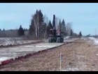 Tractor Makes His Own Road As He Goes Along
